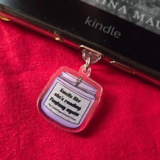 Smells like she's reading fantasy again - Kindle Charm